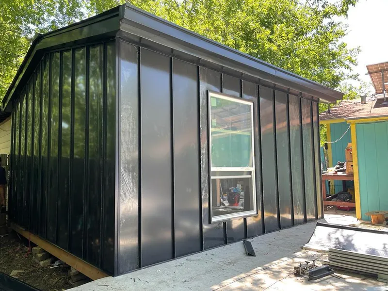 Black standing seam metal wall panels for Roof Inspection in Lenoir