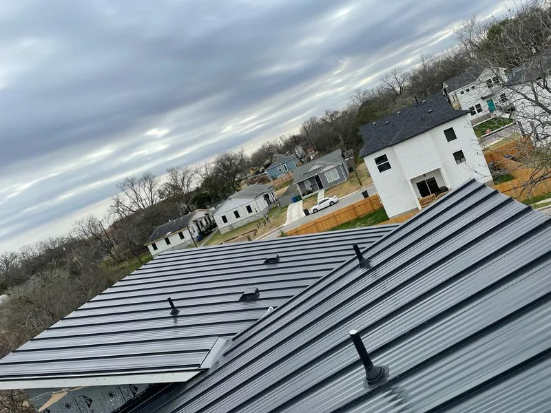 Standing seam metal roof panels with vents for Skylight Repair in Lenoir